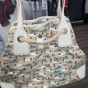 Pre loved Tod’s draw string canvas bag with leather strap, with dust bag.